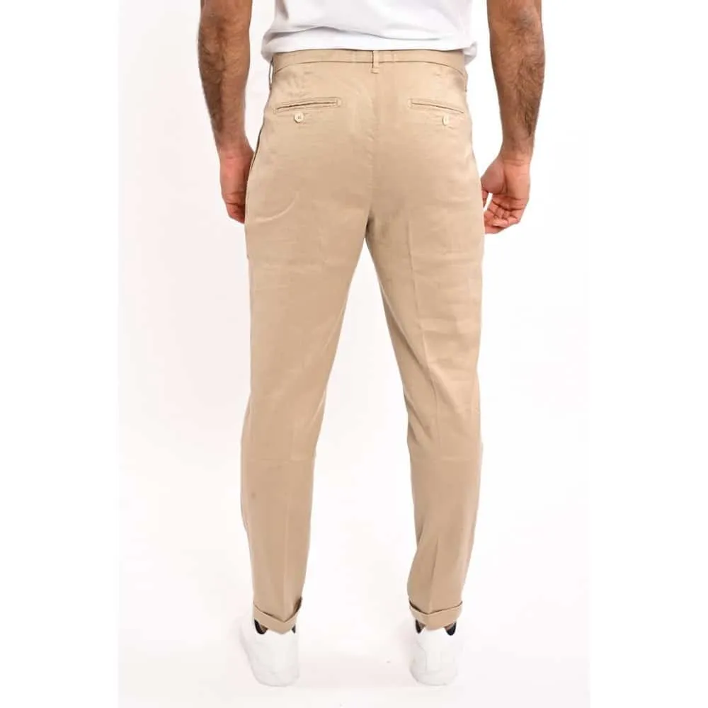 Pantalone in lino e cotone con risvolto